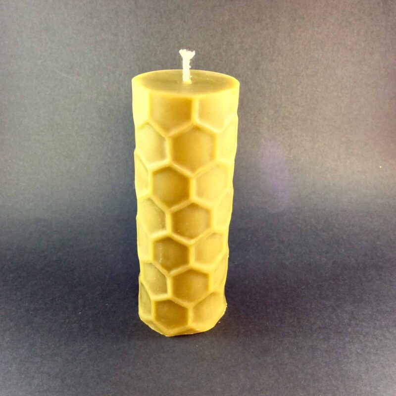 Beeswax ball candle with fleur-de-lis pattern